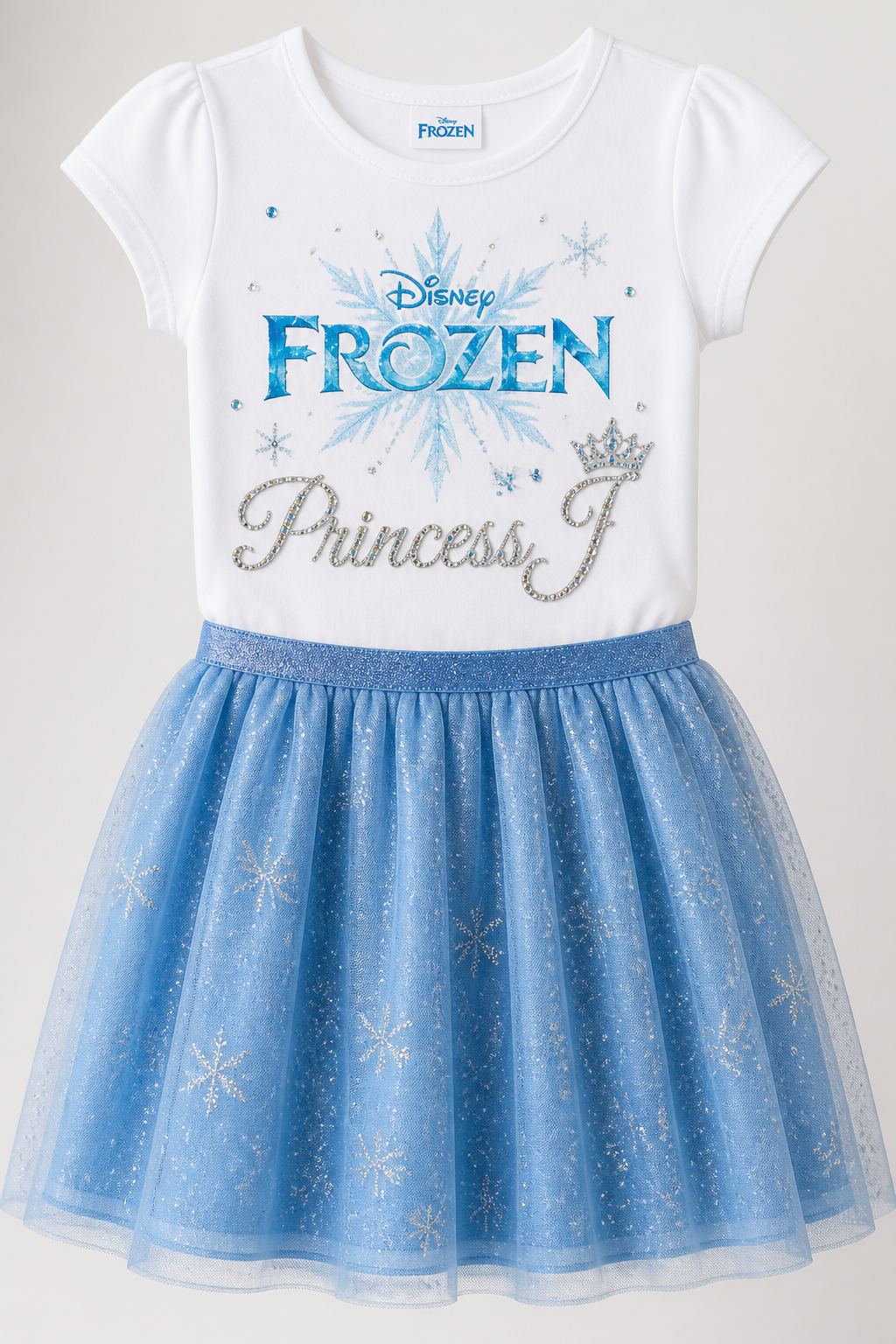 T-shirt with frozen logo and Princess J written with some bling and a blue skirt for a 5 year old
T-shirt with frozen logo and Princess J written with some bling and a blue skirt for a 5 year old, ready to wear style
