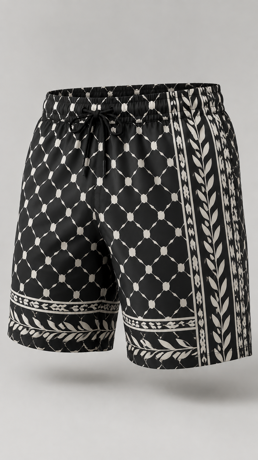 Design a premium luxury boys' swim shorts for a 15-year-old teenage boy, inspired by the traditional Palestinian Kufiya, reinterpreted into a sophisticated, modern and contemporary luxury swimwear design.
Create a refined, modern tailored swim-short silhouette with a premium mid-length cut, clean masculine proportions, a comfortable slightly structured fit, and an elegant high-end appearance suitable for both swimming and premium beachwear.
Use premium high-performance swimwear fabric that looks lightweight, smooth, soft, durable, slightly stretchy and quick-drying, with a subtle luxurious finish.
The entire visual identity should be inspired by the traditional Palestinian Kufiya pattern, but reinterpret it as a sophisticated contemporary fashion print rather than a literal traditional scarf.
Use refined geometric Kufiya-inspired motifs with subtle fishnet-like geometric structures and organic olive-leaf-inspired details, arranged into an elegant repeating textile pattern.
The print should feel modern, sophisticated and premium, with carefully controlled scale, spacing and visual balance. Avoid childish cartoon graphics, oversized motifs, souvenir aesthetics or a literal printed scarf appearance.
Use a deep black or very dark charcoal base with an elegant off-white/ivory Kufiya-inspired geometric print.
The overall design should communicate premium Middle Eastern identity, Palestinian cultural inspiration, modern luxury, teenage sophistication, sport performance and high-end craftsmanship.
The garment should look like a real premium swimwear product that could realistically be manufactured by a high-end swimwear factory.
Show realistic fabric texture, natural folds, professional stitching, clean seams, precise garment construction and realistic proportions.
Create a high-end professional fashion product visualization in a clean studio setting, with realistic lighting and photorealistic premium swimwear photography.
Show the shorts clearly in a front three-quarter view, focusing on the overall silhouette, fabric, print placement, proportions and luxury aesthetic.
Do not add unnecessary zippers, extra pockets, straps, buckles, buttons or decorative elements.
Design a premium luxury boys' swim shorts for a 15-year-old teenage boy, inspired by the traditional Palestinian Kufiya, reinterpreted into a sophisticated, modern and contemporary luxury swimwear design.
Create a refined, modern tailored swim-short silhouette with a premium mid-length cut, clean masculine proportions, a comfortable slightly structured fit, and an elegant high-end appearance suitable for both swimming and premium beachwear.
Use premium high-performance swimwear fabric that looks lightweight, smooth, soft, durable, slightly stretchy and quick-drying, with a subtle luxurious finish.
The entire visual identity should be inspired by the traditional Palestinian Kufiya pattern, but reinterpret it as a sophisticated contemporary fashion print rather than a literal traditional scarf.
Use refined geometric Kufiya-inspired motifs with subtle fishnet-like geometric structures and organic olive-leaf-inspired details, arranged into an elegant repeating textile pattern.
The print should feel modern, sophisticated and premium, with carefully controlled scale, spacing and visual balance. Avoid childish cartoon graphics, oversized motifs, souvenir aesthetics or a literal printed scarf appearance.
Use a deep black or very dark charcoal base with an elegant off-white/ivory Kufiya-inspired geometric print.
The overall design should communicate premium Middle Eastern identity, Palestinian cultural inspiration, modern luxury, teenage sophistication, sport performance and high-end craftsmanship.
The garment should look like a real premium swimwear product that could realistically be manufactured by a high-end swimwear factory.
Show realistic fabric texture, natural folds, professional stitching, clean seams, precise garment construction and realistic proportions.
Create a high-end professional fashion product visualization in a clean studio setting, with realistic lighting and photorealistic premium swimwear photography.
Show the shorts clearly in a front three-quarter view, focusing on the overall silhouette, fabric, print placement, proportions and luxury aesthetic.
Do not add unnecessary zippers, extra pockets, straps, buckles, buttons or decorative elements.
