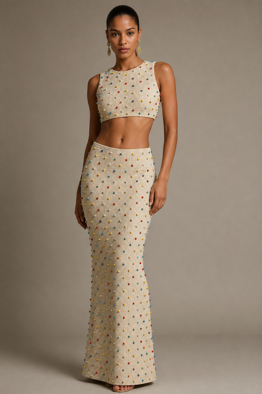 tight Crop top with red and yellow and blue beads all over top with no design on beads just scattered all over. Tight long skirt with red and yellow and blue beads with no design just scattered all over.
Contemporary fashion design: Form-fitting crop top and long skirt set. Scattered red, yellow, and blue beads adorn both pieces, creating a textured surface. Clean lines, body-conscious silhouette. Cotton with silk bead accents.