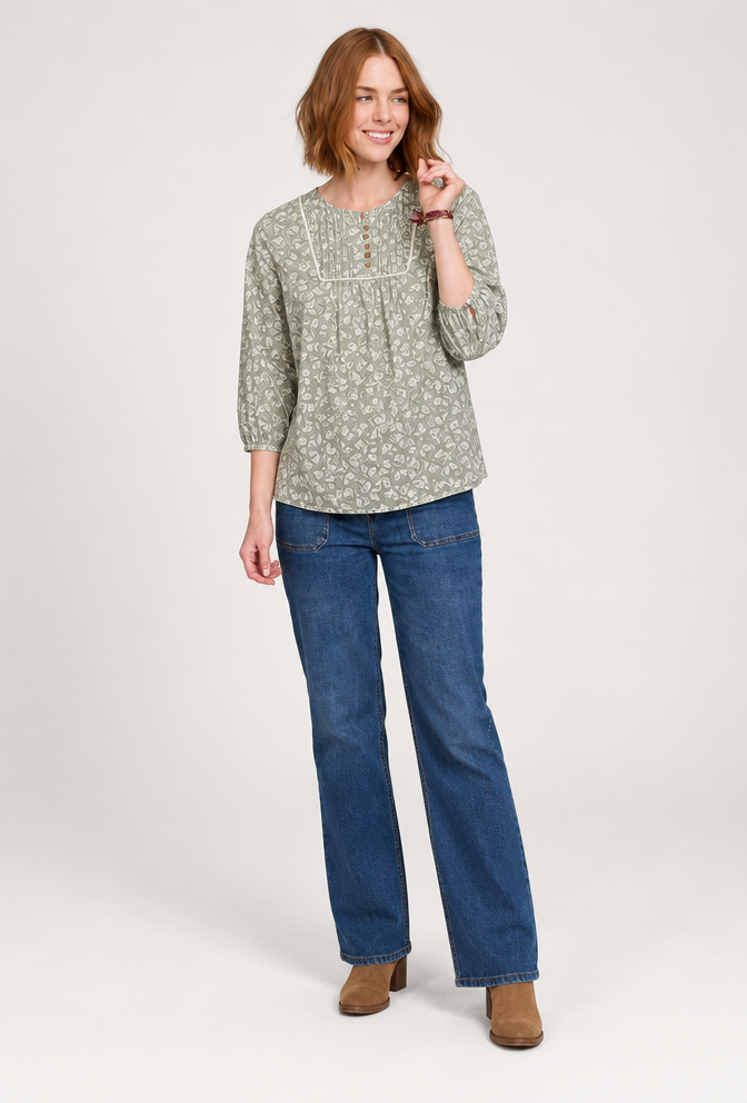 On-model photoshoot (studio)
Show the garment from image 1 worn by the person in image 2, standing in a professional photo studio with a clean seamless background and soft editorial lighting. Keep the person's face, hair, skin tone and identity exactly the same. Reproduce the garment's exact design, color, fabric and details faithfully. Full-body shot, photorealistic, no text. Additional instructions: put the second top on the womens don't change anything in the picture.