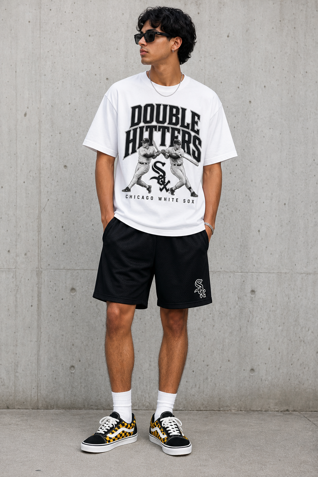 White t-shirt with black and grey letters saying double hitters. Little letters at bottom of t-shirt on right hand side put Chicago White Sox. Black shorts. black gym shoes with white laces and yellow and black checkers.
Contemporary fashion design: White cotton t-shirt with a relaxed fit, featuring a bold black and grey "Double Hitters" graphic and small "Chicago White Sox" text. Black athletic shorts. Black sneakers with white laces and a yellow and black checkerboard pattern.