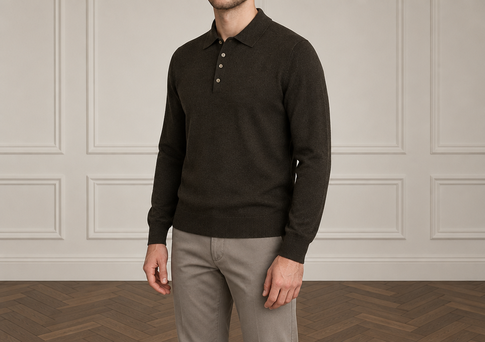 On-model photoshoot (studio)
Show the garment from the image worn by a professional fashion model standing in a professional photo studio with a clean seamless background and soft editorial lighting. Reproduce the garment's exact design, color, fabric and details faithfully. Full-body shot, photorealistic, no text. Additional instructions: Premium men's fashion e-commerce product photography of the EXACT jumper from the supplied product reference, matching the established premium catalogue pose, body rotation, camera angle, proportions and interior studio aesthetic.
The supplied jumper is the ABSOLUTE PRODUCT REFERENCE.
The JUMPER is the MAIN PRODUCT and must be reproduced with maximum accuracy.
COMPOSITION — ABSOLUTELY CRITICAL:
Create a premium men's fashion catalogue photograph focused primarily on the jumper.
Show the male model approximately from the LOWER CHIN / NECK AREA down to the MID-THIGH AREA.
The framing must be slightly wider and slightly more distant than a tight upper-body crop.
The purpose of the wider framing is to show BOTH:
1. the complete jumper clearly,
2. the architectural studio wall AND visible wooden parquet floor in the same image.
The complete jumper must be visible:
neckline,
collar if present,
shoulders,
chest,
sleeves,
cuffs,
waist,
bottom hem.
Both complete arms must be visible.
Both hands must be visible.
The upper portion of the trousers or jeans must be visible.
The frame should extend low enough to clearly show a visible section of the DARK BROWN HERRINGBONE PARQUET FLOOR.
The transition between the wall and floor must be visible.
DO NOT crop so tightly that only the wall is visible.
DO NOT create a chest-only crop.
DO NOT create a waist-up crop.
DO NOT crop the bottom hem of the jumper.
DO NOT crop the cuffs.
DO NOT crop the hands.
The jumper must remain the MAIN visual focus even though more of the studio environment is visible.
NO FULL FACE VISIBLE.
The eyes, nose and main facial features must remain completely outside the frame.
Only the lower chin / jawline and neck may appear at the top of the frame.
POSE — MATCH THE ESTABLISHED REFERENCE:
Use the same calm, masculine, sophisticated premium catalogue pose.
The model stands in a subtle natural THREE-QUARTER / SEMI-SIDE position relative to the camera.
The body must NOT be completely front-facing.
The LEFT SHOULDER is positioned slightly FORWARD and slightly CLOSER TO THE CAMERA.
The RIGHT SHOULDER is positioned slightly FARTHER BACK.
The LEFT SIDE of the torso is slightly closer to the camera.
The torso and hips follow the same subtle natural rotation.
Use approximately 10–20 degrees of body rotation.
The rotation must remain subtle.
Do NOT create a strong side profile.
Do NOT mirror the pose.
Do NOT put the RIGHT SHOULDER forward.
Do NOT make the shoulders completely symmetrical and frontal.
LEFT SHOULDER FORWARD is mandatory.
The pose must look calm, relaxed, masculine and premium.
ARMS AND HANDS:
Both arms hang naturally and STRAIGHT DOWN alongside the body.
Both hands remain naturally positioned beside the outer thighs.
The elbows remain naturally straight with minimal anatomical relaxation.
Hands are relaxed.
Fingers are naturally relaxed and slightly separated.
The arms and hands follow the natural three-quarter perspective of the body.
No hands in pockets.
No crossed arms.
No raised arms.
No touching the jumper.
No adjusting the neckline.
No adjusting the sleeves.
No pulling the cuffs.
No pulling the hem.
No touching the trousers.
No fashion gestures.
JUMPER — ABSOLUTE PRODUCT PRESERVATION:
Use the EXACT jumper from the supplied product image.
The generated jumper must look like the EXACT SAME physical product as in the source photograph.
Preserve the exact:
design,
color,
shade,
fabric,
material,
fabric texture,
knit structure,
knit density,
surface finish,
silhouette,
fit,
proportions,
length,
shoulder width,
shoulder construction,
chest width,
waist width,
neckline,
collar construction,
sleeve shape,
sleeve width,
sleeve length,
cuffs,
cuff width,
bottom hem,
ribbing if present,
stitching,
seams,
logos if present,
buttons if present,
zipper if present,
pockets if present,
and every other original construction detail.
Do NOT redesign the jumper.
Do NOT change its color.
Do NOT change its shade.
Do NOT change its material.
Do NOT change its fabric texture.
Do NOT change the knit structure.
Do NOT change the original fit.
Do NOT make it tighter.
Do NOT make it looser.
Do NOT make it oversized.
Do NOT shorten it.
Do NOT lengthen it.
Do NOT change the neckline.
Do NOT change the collar.
Do NOT change the shoulders.
Do NOT change the sleeves.
Do NOT change the cuffs.
Do NOT change the bottom hem.
Do NOT add details that are not present.
Do NOT remove original details.
Do NOT add contrasting trim unless it exists in the source image.
Do NOT add logos or branding that are not present.
The exact product identity must remain unmistakable.
FABRIC — MATCH THE SUPPLIED PRODUCT:
Analyze the actual fabric and knit structure of the supplied jumper and reproduce it accurately.
Preserve the exact visual character of the original material.
The fabric must look premium, realistic and tactile.
Accurately reproduce:
surface texture,
knit fineness,
knit density,
softness,
fabric weight,
natural drape,
and natural surface finish.
If the supplied jumper is made from viscose or a smooth fine knit:
preserve a smooth,
fine,
soft,
fluid,
refined,
supple,
premium appearance with only a very subtle natural luster.
If the supplied jumper has another fabric or knit structure:
follow the SOURCE PRODUCT exactly.
Do NOT automatically make every jumper look like viscose.
The source product determines the material appearance.
Never make the fabric artificially glossy.
Never create plastic-looking material.
Never create a wet-look effect.
Never make the garment look like satin or synthetic plastic.
Show subtle natural fabric folds around:
the waist,
sides,
elbows,
and sleeves.
The folds must remain natural and controlled.
FIT:
Preserve the EXACT original fit of the supplied jumper.
The shoulder line must match the source product.
The chest must retain the original volume.
The sleeves must preserve their exact width and length.
The waist and bottom hem must preserve their original proportions.
Do NOT artificially tuck the jumper into the trousers unless the source image specifically shows that styling.
By default, allow the jumper to fall naturally over the waistband.
TROUSERS / JEANS — AUTOMATIC SELECTION:
The AI must independently choose the LOWER GARMENT according to the EXACT color, shade, material and style of the supplied jumper.
The trousers shown in any pose reference are NOT mandatory.
DO NOT automatically reproduce the same trousers every time.
Different jumpers should be combined with different suitable trousers or jeans.
The AI may choose between:
— refined tailored trousers,
— clean smart-casual trousers,
— premium chinos,
— straight-fit jeans,
depending on which option best complements the specific jumper.
The COLOR of the lower garment must also be selected independently.
Possible sophisticated colors include:
black,
charcoal,
graphite,
dark grey,
medium grey,
light grey,
navy,
dark navy,
brown,
dark brown,
chocolate,
taupe,
stone,
beige,
sand,
cream,
off-white,
ecru,
olive,
dark denim,
medium denim,
light denim,
or another sophisticated muted shade.
Do NOT use the same trouser color in every generation.
Do NOT automatically use beige trousers.
Do NOT automatically use black trousers.
Do NOT automatically use jeans.
Do NOT automatically use formal trousers.
Choose the TYPE and COLOR of the lower garment according to EACH specific jumper.
For darker jumpers, choose lighter, medium or dark trousers according to the most sophisticated balance.
For lighter jumpers, choose darker, medium or tonal trousers according to the complete color harmony.
For colored jumpers, choose a tasteful neutral or complementary muted shade.
Avoid loud colors.
Avoid bright saturated trousers.
Avoid unnecessary strong contrast.
IMPORTANT:
THE JUMPER IS FIXED.
THE LOWER GARMENT IS FLEXIBLE.
NEVER CHANGE THE JUMPER COLOR TO MATCH THE TROUSERS.
CHANGE THE TROUSERS OR JEANS TO COMPLEMENT THE JUMPER.
THE AI CHOOSES THE MOST APPROPRIATE LOWER GARMENT FOR EACH SPECIFIC JUMPER.
The lower garment must remain visually secondary.
The jumper must always remain the main product.
CAMERA AND FRAMING:
Use a slightly wider premium catalogue composition than a normal upper-body crop.
Camera positioned approximately at CHEST LEVEL.
Move the camera slightly farther away from the model so the composition includes:
the lower chin / neck,
complete shoulders,
complete jumper,
both full arms,
both hands,
upper legs,
the visible architectural wall,
the wall-to-floor transition,
and a clearly visible section of parquet floor.
The frame should extend approximately to MID-THIGH.
Do NOT zoom in too tightly.
Do NOT fill the entire frame with only the torso.
The model should occupy approximately 70–80% of the image height.
Leave enough environmental space around the model so the studio interior is clearly recognizable.
Natural premium catalogue perspective.
The camera observes the model from the same subtle three-quarter angle as the body.
The LEFT side of the model is slightly closer to the camera.
No wide-angle distortion.
No dramatic perspective.
No exaggerated shoulders.
No distorted torso.
No distorted arms.
No distorted hands.
STUDIO ENVIRONMENT — ABSOLUTELY MANDATORY:
The model MUST stand in the established premium European-style INTERIOR STUDIO.
The environment must NOT be replaced by a plain photography backdrop.
BOTH THE WALL AND THE FLOOR MUST BE CLEARLY VISIBLE IN THE SAME IMAGE.
BACKGROUND WALL:
Use a warm OFF-WHITE / LIGHT GREIGE architectural interior wall.
The wall must contain clearly visible CLASSIC RECTANGULAR DECORATIVE WALL MOULDING.
The moulding must look:
architectural,
elegant,
subtle,
symmetrical,
refined,
and premium.
Multiple rectangular moulding sections should be visible behind and around the model.
The wall must look like a real sophisticated interior wall.
DO NOT use a plain wall.
DO NOT use a seamless photography backdrop.
DO NOT use a grey cyclorama.
DO NOT use an infinity wall.
DO NOT use a paper backdrop.
FLOOR — ABSOLUTELY CRITICAL:
A clearly visible section of DARK WARM BROWN NATURAL WOOD PARQUET FLOOR MUST appear in the image.
The floor must NOT be hidden below the frame.
The floor must have a refined HERRINGBONE PARQUET PATTERN.
The herringbone pattern must be clearly recognizable.
Use:
rich dark warm brown tones,
natural wood grain,
subtle realistic tonal variation,
and a premium matte finish.
The transition between the wall and the parquet floor must be clearly visible.
The floor must occupy a noticeable lower section of the image.
DO NOT generate only wall behind the model.
DO NOT crop above the floor line.
DO NOT hide the parquet.
DO NOT use a white floor.
DO NOT use a grey floor.
DO NOT use beige seamless flooring.
DO NOT use concrete.
DO NOT use tiles.
DO NOT use a seamless wall-to-floor background.
The architectural distinction between WALL and FLOOR is mandatory.
LIGHTING:
Soft diffused natural-looking premium studio lighting.
Warm neutral color temperature.
Use gentle directional light to accurately reveal:
the exact jumper color,
fabric texture,
knit structure,
neckline,
seams,
sleeves,
and natural fabric drape.
Maintain realistic tonal detail even in black or very dark jumpers.
Do NOT crush dark fabrics into flat black areas.
Use subtle realistic shadows.
No harsh shadows.
No dramatic lighting.
No cinematic lighting.
No spotlight effect.
No excessive contrast.
No artificial fabric shine.
ENVIRONMENT:
No furniture.
No chairs.
No tables.
No decorations.
No paintings.
No mirrors.
No plants.
No rugs.
No props.
No visible studio equipment.
The studio must feel:
premium,
quiet,
minimalist,
architectural,
warm,
sophisticated,
and expensive.
IMAGE STYLE:
Ultra-photorealistic.
Premium European menswear e-commerce photography.
Natural male anatomy.
Realistic skin texture.
Highly realistic jumper fabric texture.
Accurate knit structure.
Accurate garment construction.
Natural fabric drape.
Natural soft folds.
Soft controlled lighting.
Clean premium catalogue aesthetic.
Understated luxury.
No excessive retouching.
No cinematic effects.
No dramatic lighting.
No artificial fabric shine.
STRICT RULES — ABSOLUTELY MANDATORY:
JUMPER IS THE MAIN PRODUCT.
USE THE EXACT JUMPER FROM THE SUPPLIED PRODUCT IMAGE.
PRESERVE THE EXACT:
COLOR,
SHADE,
MATERIAL,
TEXTURE,
KNIT STRUCTURE,
FIT,
PROPORTIONS,
LENGTH,
NECKLINE,
SHOULDERS,
SLEEVES,
CUFFS,
BOTTOM HEM,
AND ALL ORIGINAL PRODUCT DETAILS.
DO NOT RECOLOR THE JUMPER.
DO NOT REDESIGN THE JUMPER.
DO NOT CHANGE THE ORIGINAL FIT.
FRAME FROM LOWER CHIN / NECK TO APPROXIMATELY MID-THIGH.
NO FULL FACE VISIBLE.
COMPLETE JUMPER VISIBLE.
BOTH SHOULDERS VISIBLE.
BOTH COMPLETE SLEEVES VISIBLE.
BOTH HANDS VISIBLE.
SUBTLE THREE-QUARTER / SEMI-SIDE POSITION.
LEFT SHOULDER FORWARD AND CLOSER TO CAMERA.
RIGHT SHOULDER SLIGHTLY BACK.
LEFT SIDE OF TORSO CLOSER TO CAMERA.
NEVER MIRROR THE POSE.
NEVER PUT THE RIGHT SHOULDER FORWARD.
NEVER MAKE THE MODEL COMPLETELY FRONT-FACING.
BOTH ARMS STRAIGHT DOWN.
BOTH HANDS RELAXED BESIDE THE THIGHS.
NO HANDS IN POCKETS.
NO FASHION GESTURES.
THE AI MUST CHOOSE THE TROUSERS OR JEANS ITSELF ACCORDING TO THE SPECIFIC JUMPER.
TROUSER TYPE MAY CHANGE BETWEEN DIFFERENT JUMPERS.
TROUSER COLOR MAY CHANGE BETWEEN DIFFERENT JUMPERS.
DO NOT USE THE SAME LOWER GARMENT EVERY TIME.
THE LOWER GARMENT IS SECONDARY.
THE JUMPER ALWAYS REMAINS THE MAIN PRODUCT.
STUDIO IS MANDATORY.
BOTH WALL AND FLOOR MUST BE VISIBLE.
WARM OFF-WHITE / LIGHT GREIGE WALL.
CLEAR CLASSIC RECTANGULAR WALL MOULDING.
VISIBLE WALL-TO-FLOOR TRANSITION.
CLEARLY VISIBLE DARK WARM BROWN HERRINGBONE PARQUET FLOOR.
DO NOT CROP ABOVE THE FLOOR LINE.
DO NOT GENERATE WALL ONLY.
NO PLAIN BACKDROP.
NO SEAMLESS BACKGROUND.
NO CYCLORAMA.
SOFT PREMIUM NATURAL-LOOKING CATALOGUE LIGHTING.
MATCH THE ESTABLISHED PREMIUM INTERIOR STUDIO AESTHETIC AS CLOSELY AS POSSIBLE..