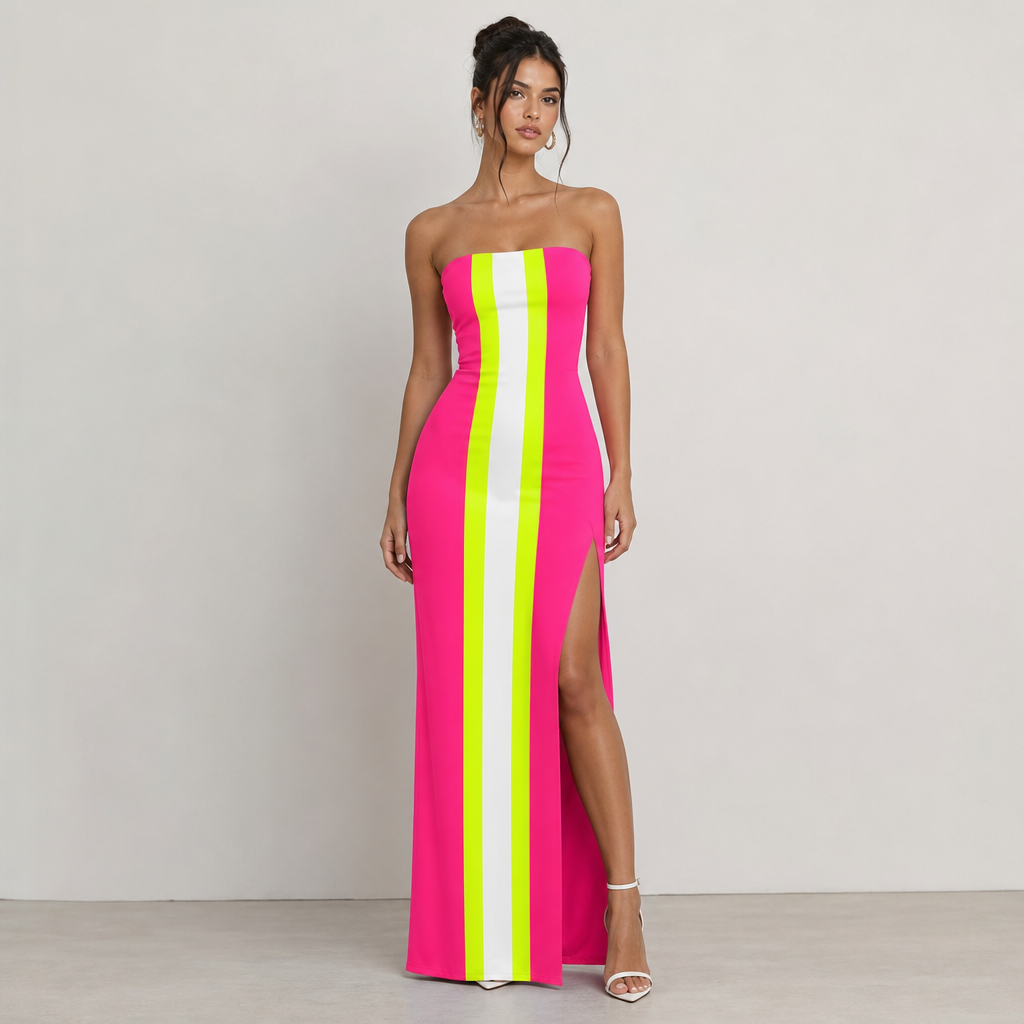 Hot pink long tight strapless dress with thick white stripe in center with neon yellow stripe and neon green stripe in center of dress. High slit on side of dress.
Contemporary fashion design: **Vibrant hot pink strapless column dress**. Body-hugging fit, floor-length, with a high side slit. Features a bold central stripe of white, flanked by neon yellow and neon green stripes. Smooth cotton fabric.